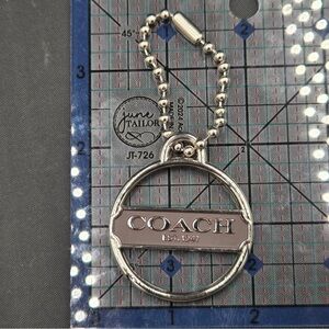 Coach hang tag